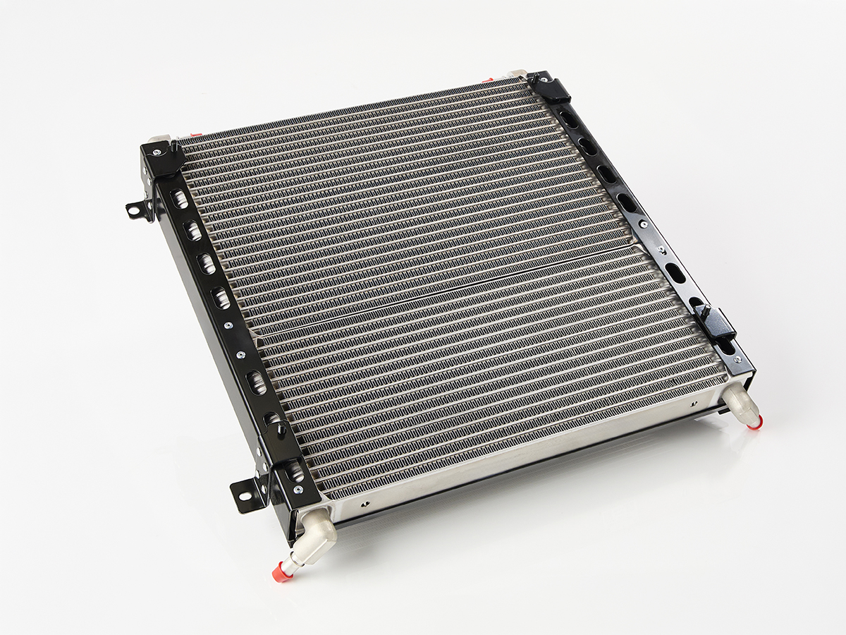 An image showing the front view of Cooler oil, hyd and trans 14 and 21 plates (Part 332/G3800)